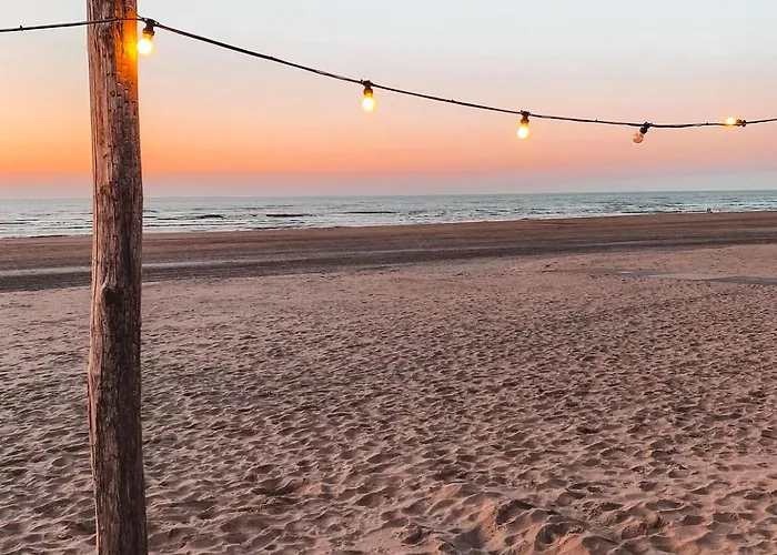 Beleef Strandhuisje דירה